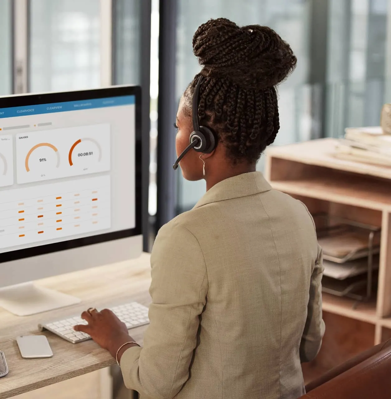 A female contact center agent looking at the RingCentral agent dashboard