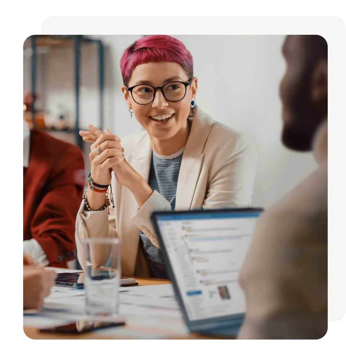A diverse group of employees in a meeting