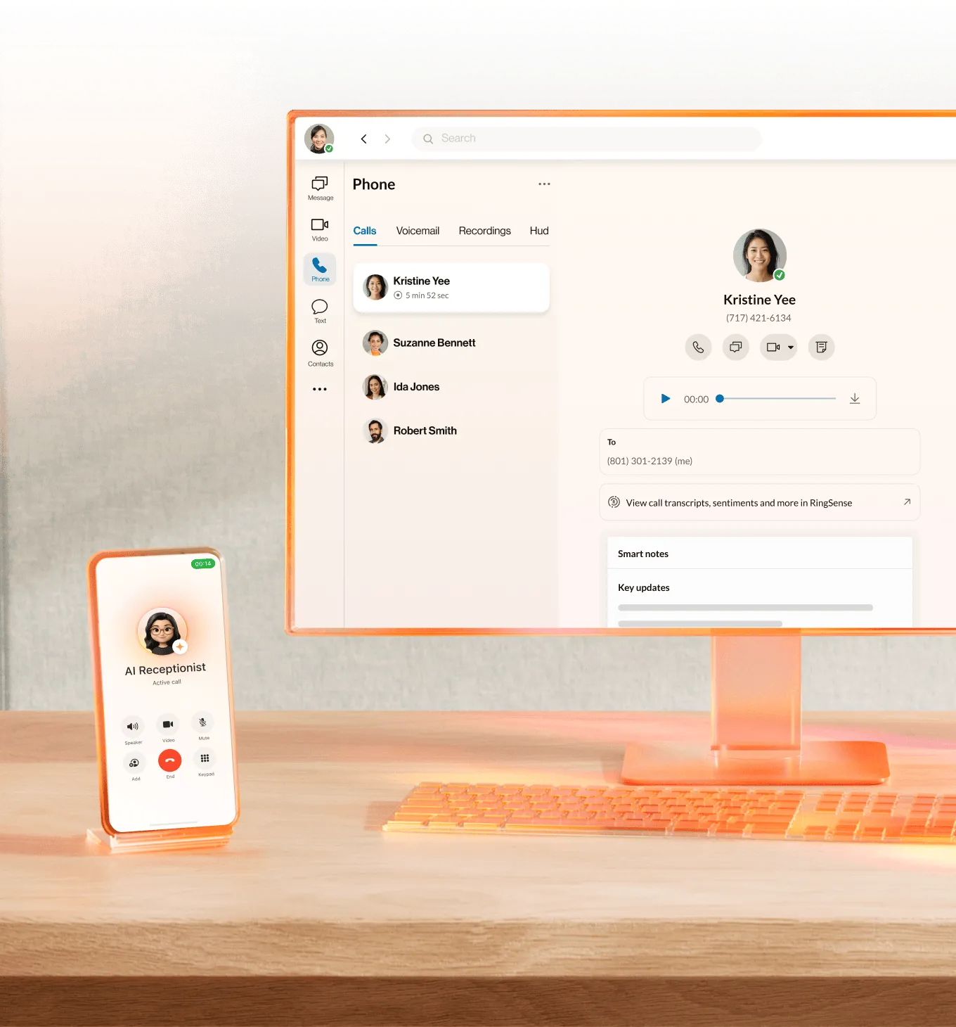 A desktop monitor and smartphone displaying a unified communications interface with an AI receptionist, call logs, and RingSense AI analytics.