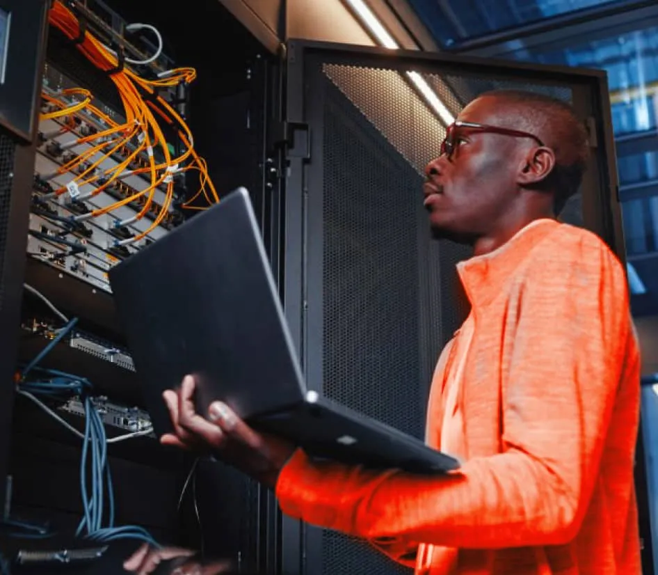 A RingCentral IT personnel inspecting a motherboard
