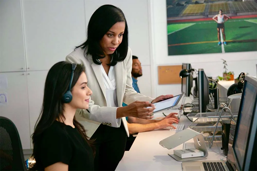 Call center manager reviewing their team performance