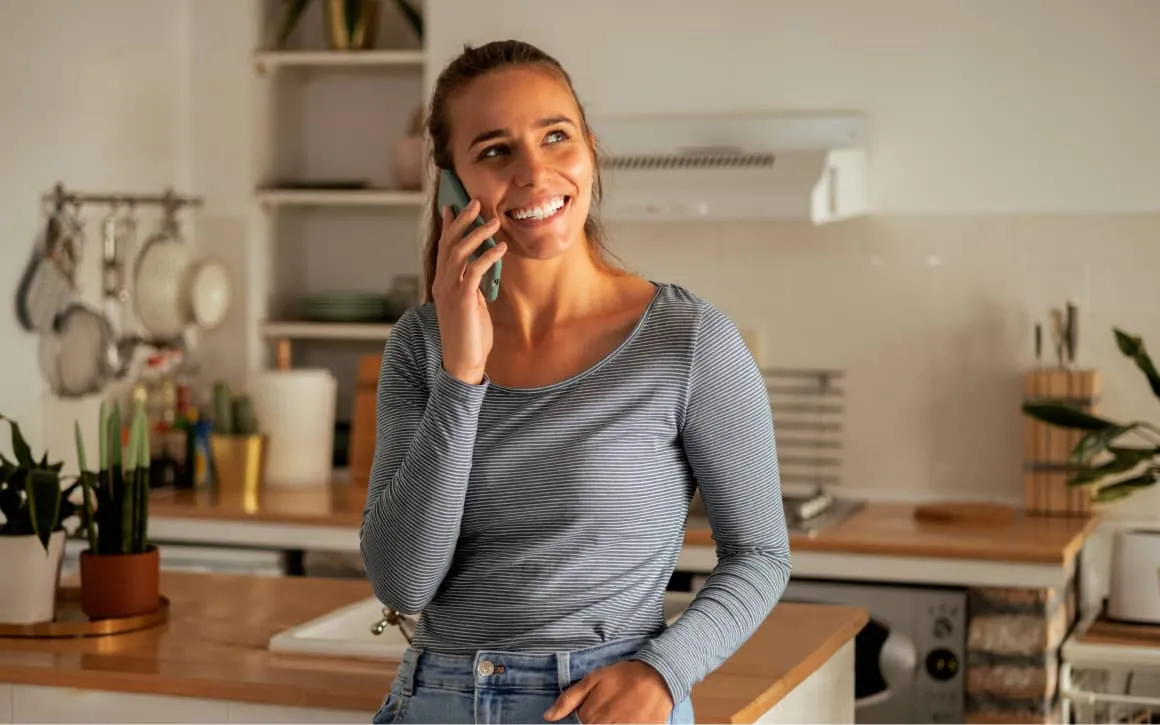 A woman on a call using a mobile phone