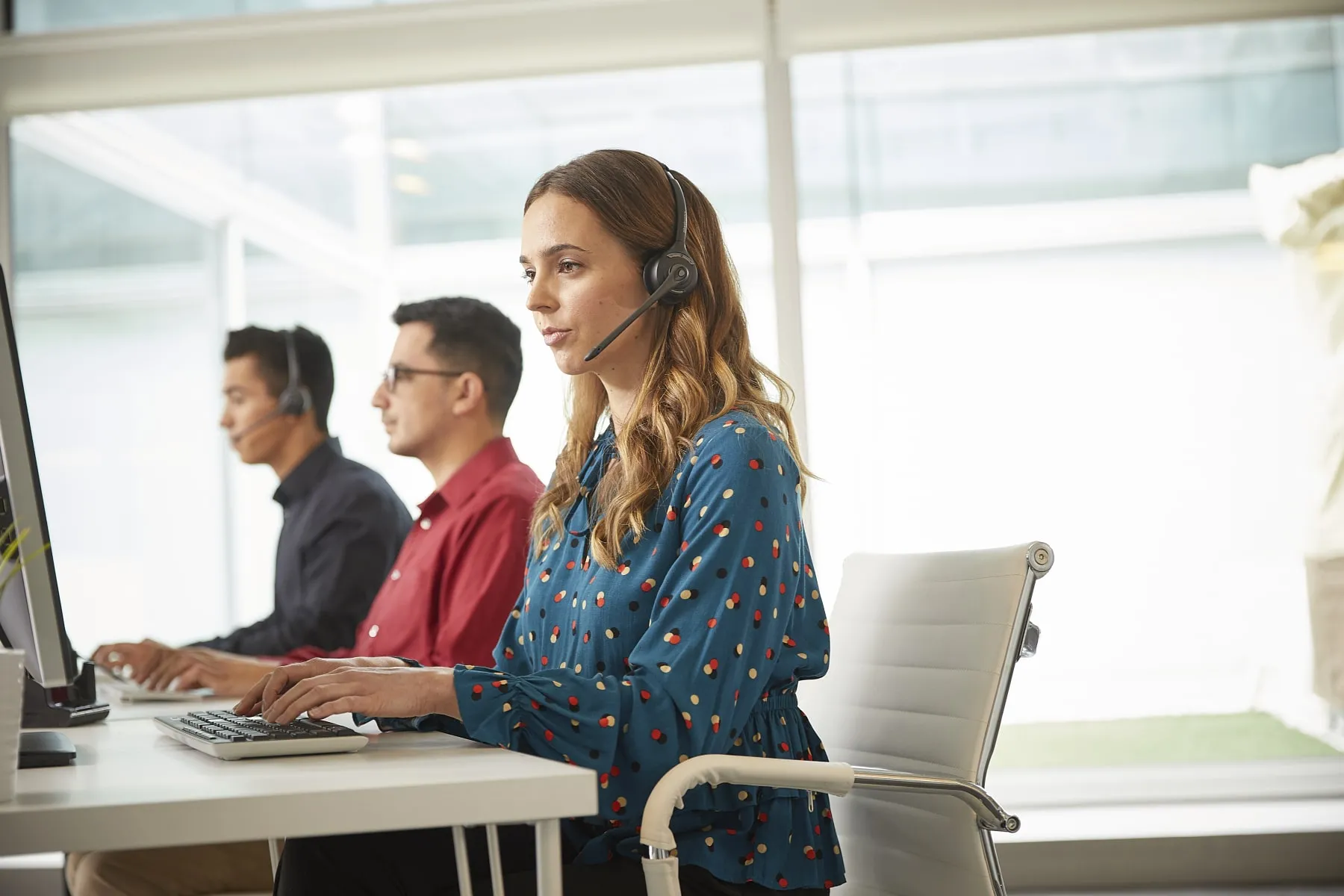 Inbound call center agents receiving incoming calls from customers